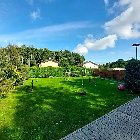 Dom Rozany Caloroczny Ogrzewany Na Wiejskiej 5 Vakantiehuis *